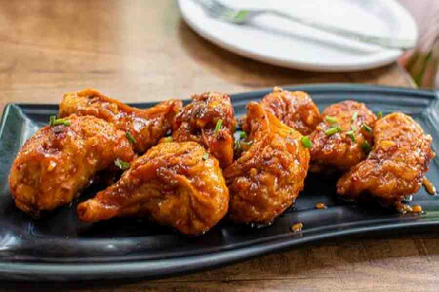 Chicken Momo (In Schezwan Sauce : 8 Pcs)